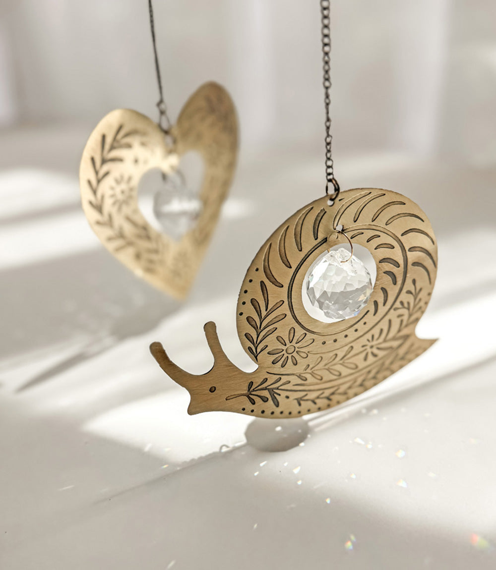 Surya Snail Engraved Brass Suncatcher